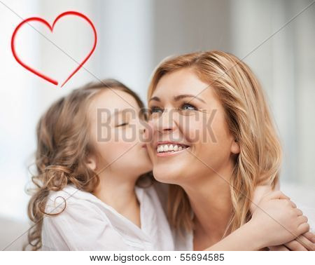 family, children and love concept - hugging mother and daughter