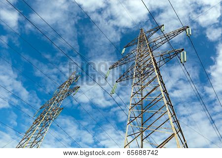 Power Line And Blue Sky With Clouds