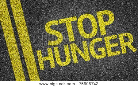 Stop Hunger written on the road