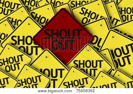 Shout Out written on multiple road sign