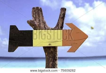 Belgium wooden sign with a river on background 