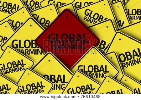 Global Warming written on multiple road sign 