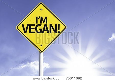 I'm Vegan! road sign with sun background 