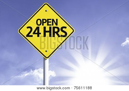 Open 24Hrs road sign with sun background 