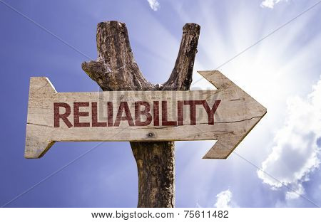 Reliability wooden sign with sky background