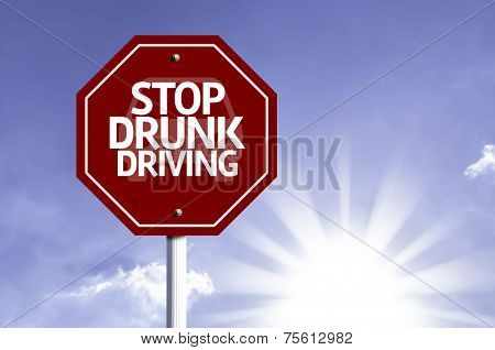 Stop Drunk Driving red sign with sun background 