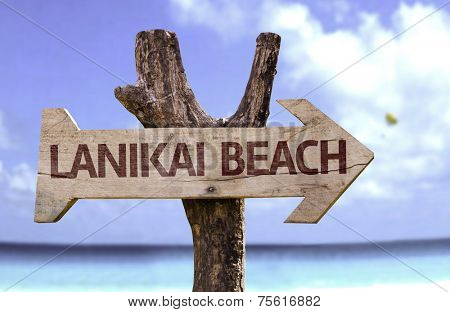 Lanikai Beach wooden sign with a beach on background