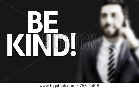 Business man with the text Be Kind in a concept image