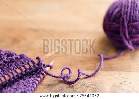 Knitting Set On Wooden Table