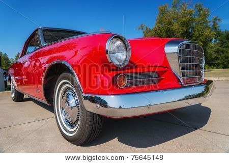 Red 1963 Studebaker Gran Turismo Classic Car