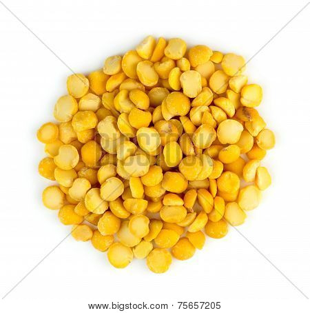 Closeup Of Heap Of Yellow Chana Split Peas Isolated Against White