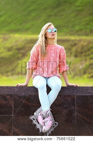 Fashion, Extreme, Fun, Youth And People Concept - Pretty Stylish Blonde Girl In Sunglasses With Roll