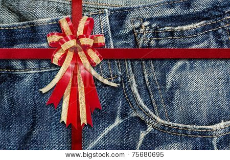 Red Ribbon On  Detailed Scan Of Jeans For Background