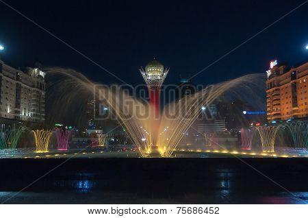 Bayterek Tower And  Fountain Show At Night