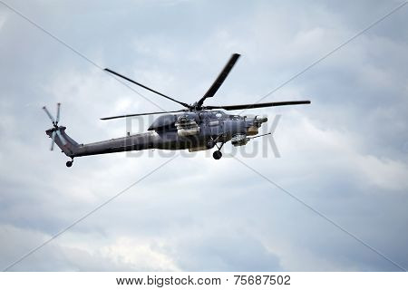 Combat Helicopter In Flight