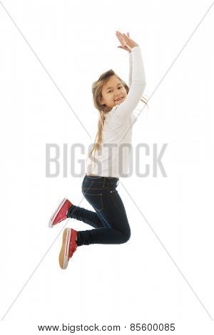Little pretty girl jumping with joy