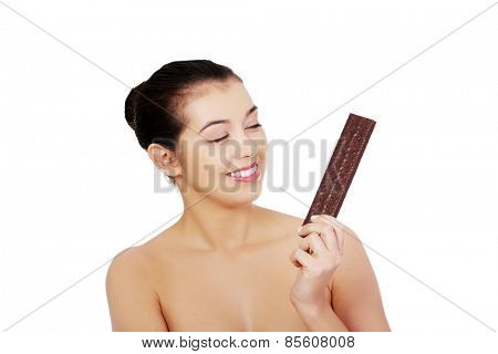 Beautiful woman holding a waffer