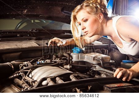 Girl Tries To Repair Broken Car