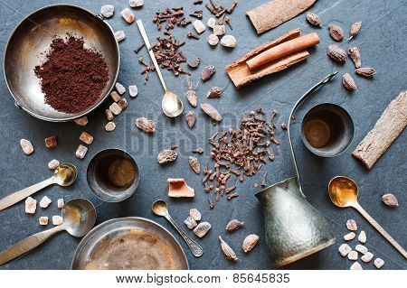 Coffee, Spices And Metal Plates On A Dark Background