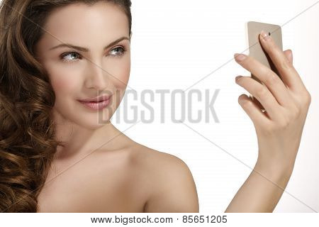 Beautiful Woman Take A Smiling Selfie With Smartfone