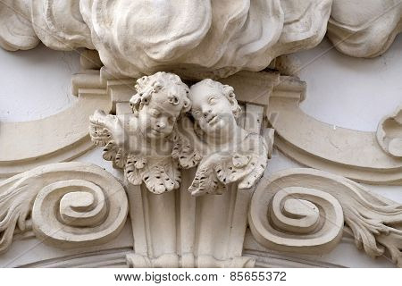 GRAZ, AUSTRIA - JANUARY 10, 2015: Angels on the portal of Mariahilf church in Graz, Styria, Austria on January 10, 2015.