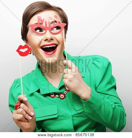 Attractive playful young woman ready for party - falce lips and glasses  