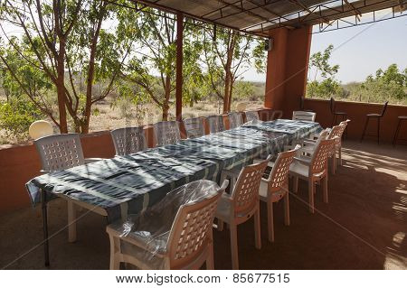Long Table And Chairs On Veranda. Turmi. Ethiopia. Africa.