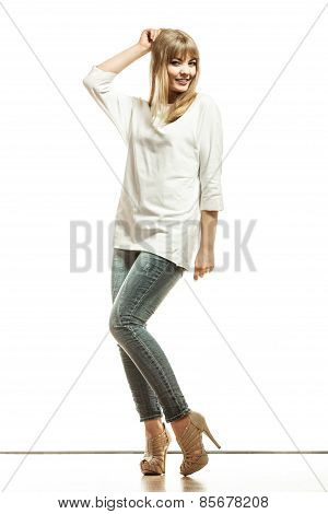 Blonde Fashion Woman In White Shirt Denim Pants