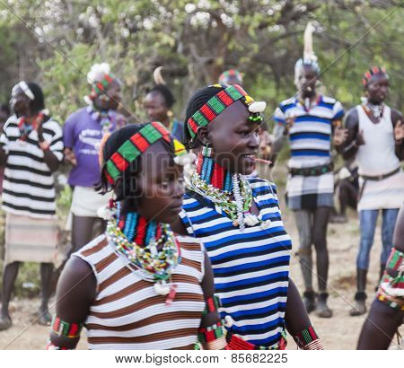 Boys And Girls At The Traditional Evangaty Ceremony. Turmi, Ethiopia