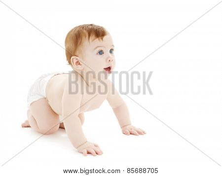 bright picture of crawling curious baby over white backgroubd