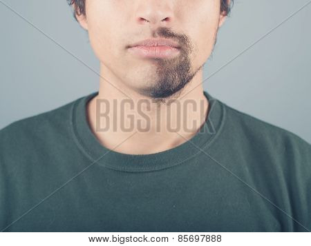 Young Man With Half Shaved Beard