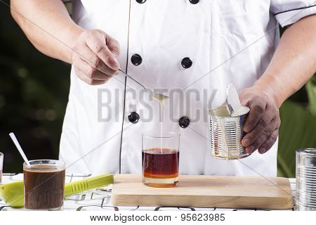 Pouring Milk To Tea