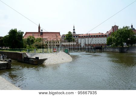 Odra River Canal And Old Buildings In Wroclaw, Poland.