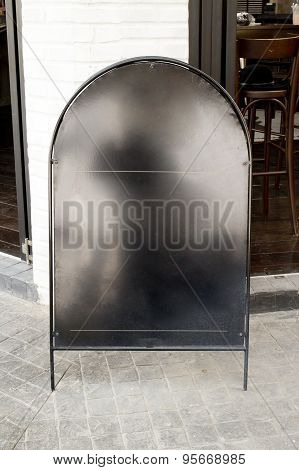 Blank Black Iron Menu Board With Clipping Path Front Of Cafe