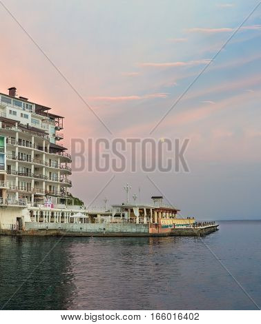 Beautiful sunset sky over the Marina in the Black sea