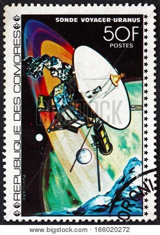 COMOROS - CIRCA 1977: a stamp printed in Comoros shows Voyager Probe Uranus Space Exploration circa 1977