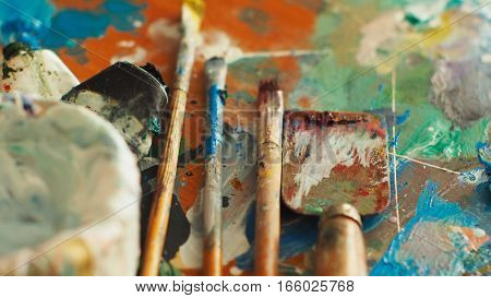 Brush And Bright Oil-paint Palette For Background