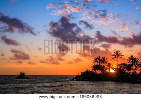 View of a beach at Noumea, New Caledonia during sunset