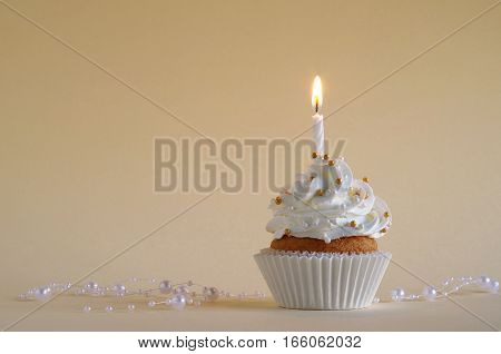 homemade birthday cake whit whipping cream and birthday candle