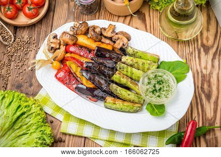 roasted vegetables on the grill. zucchini, mushrooms paprika