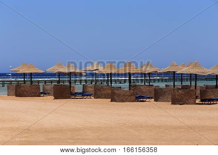 Beach Sun Parasol And Blue Sky, Holliday In Egypt