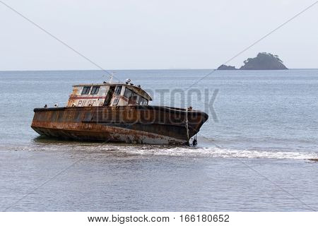 June 12 2016 Portobelo Panama: shipwreck on the rocks in the bay