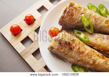 fried shad with chilli australian fish on plate