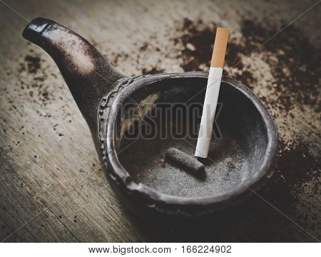 Ashtray with cigarette close up. image no smoking concept background