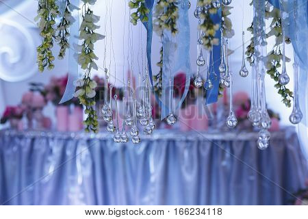 Decorationof the banquet hall at a wedding ceremony in the evening light
