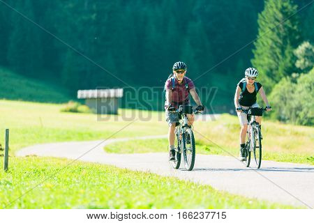 Active senior couple having fun outdoors, enjoying the good weather.