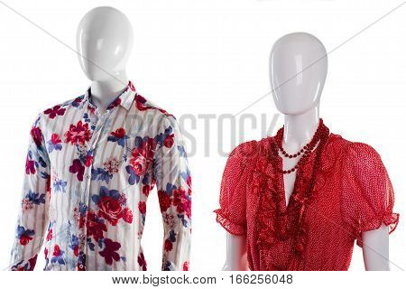 Shirt and sarafan on mannequins. Mannequins in fashionable summer apparel. Outfit idea for young couples. Garments for man and women.