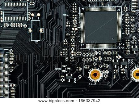 Integrated semiconductor microchip microprocessor on blue circuit board representative of the high tech industry and computer science.macro.concept compute harware