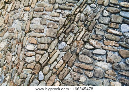 Closeup of old cobblestone road in Aigle Switzerland