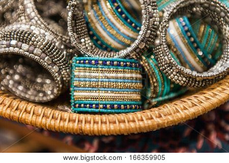 Set of traditional indian bracelets on a market. Authentic jewelry